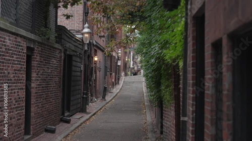 Narrow cedar lane way private lane in historic beacon hill, a historic neighborhood in Boston, Massachusetts.
