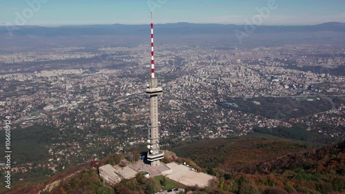 Sofia Tv tower located on Vitosha mountain filmed from drone. Cinematic aerial video shot during early autumn