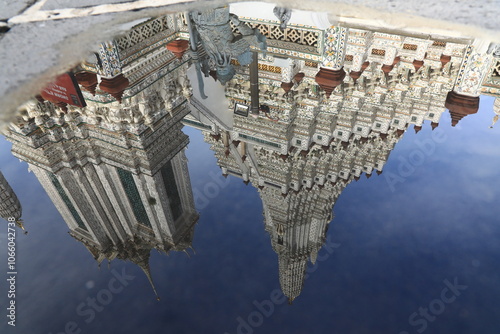 Reflection of Prang Arun on the remaining water surface.
Temple Of Dawn (Wat Arun) one of the most spectacular and recognizable Thai landmarks. Bangkok ,Thailand
 photo