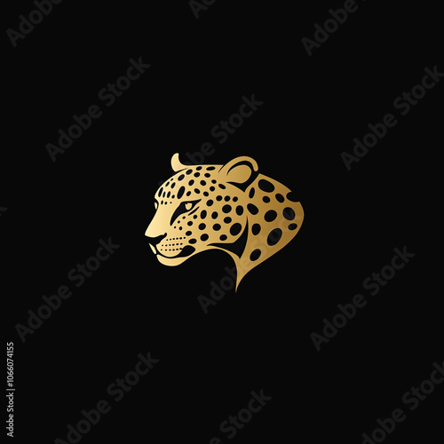 Golden Leopard Head with Black Spots on a Black Background photo