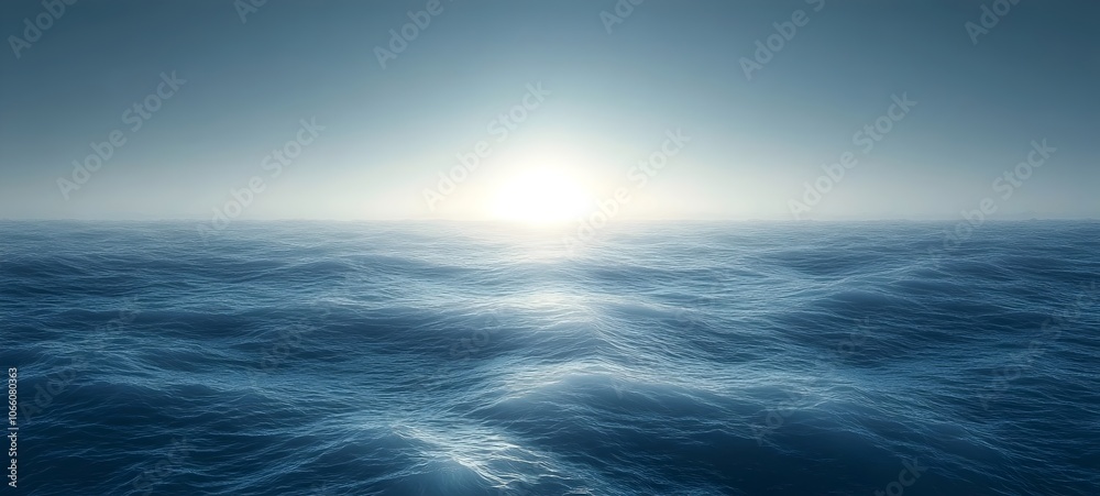Obraz premium A serene ocean landscape at sunrise, featuring gentle waves reflecting the soft glow of the early morning light against a tranquil horizon.