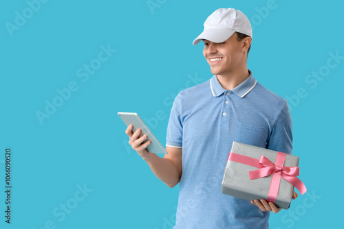 Male courier with gift box ...