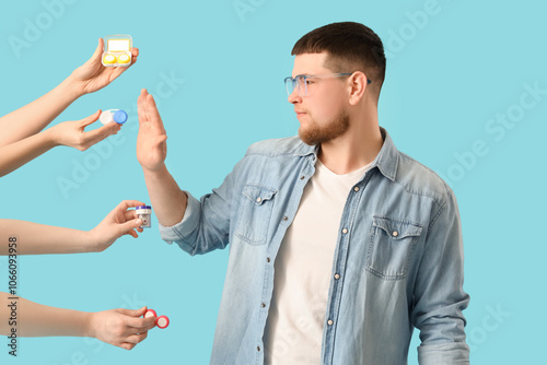 Young man in eyeglasses rej...