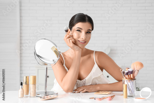 Beautiful young woman with ...