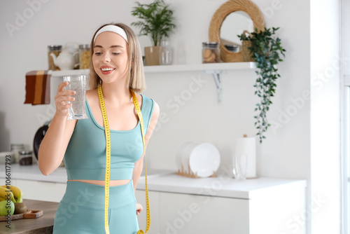 Young woman in sportswear w...