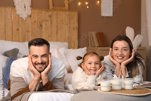 Happy parents and their lit...