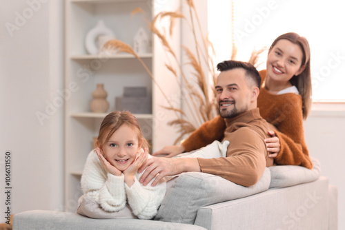 Happy parents and their lit...
