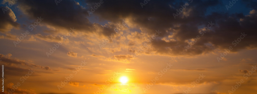 Fototapeta premium Banner Golden sky sunrise dramatic beautiful landscape view. Dawn sky gold dusk time cloudscape with sunlight. Panorama Dramatic sunset scenic landscape. Beautiful landscape nature with copy space