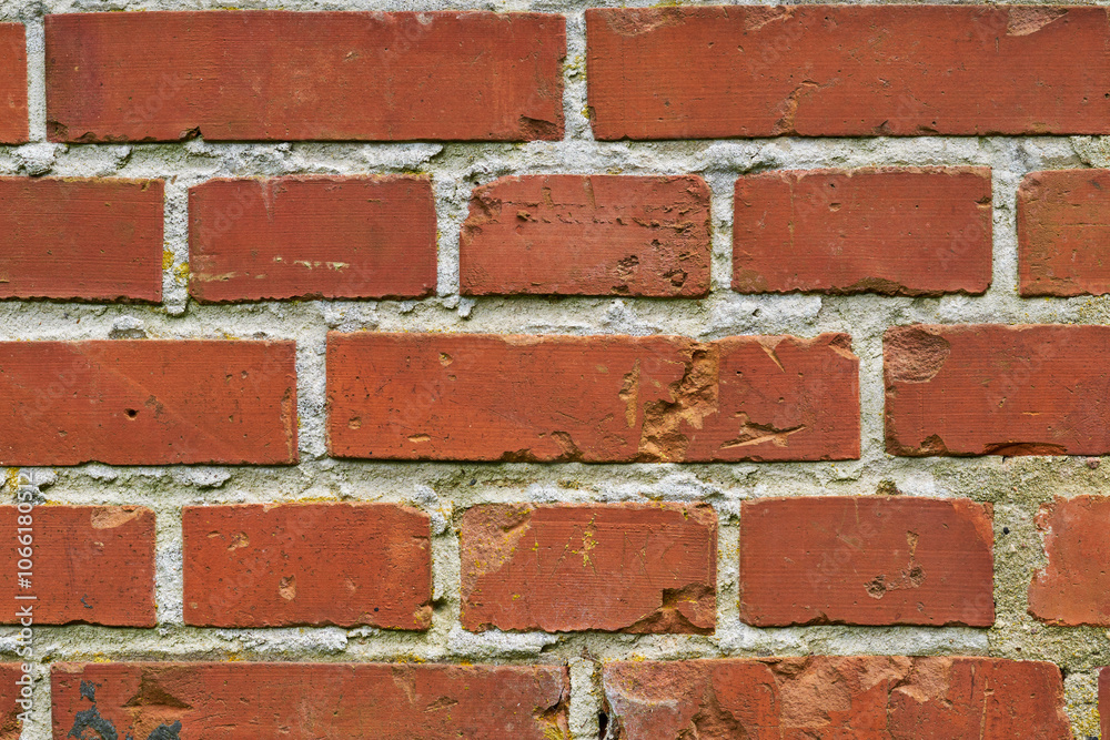 Obraz premium Brick wall, building and city with real estate on background with masonry, outdoor and exterior with pattern. Empty, texture and concrete for architecture, property and urban housing in Colombia