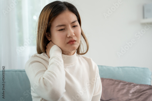 office syndromes, woman massaging neck pain due to work and using a computer, digital composite of a focused spine of neck pain and shoulder pain symptoms , injuries, health care, medical, myositis photo