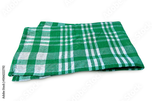 Green checkered napkin towel isolated on white background with clipping path. Kitchen napkin or table cloth in green. Folded cloth for mockup with copy space, Flat lay. Minimal style.