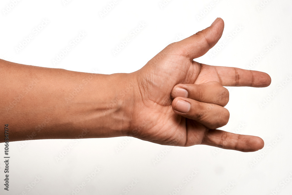 Woman rock or heavy metal music hand sign isolated on white background
Woman rock or heavy metal music hand sign isolated on white background
