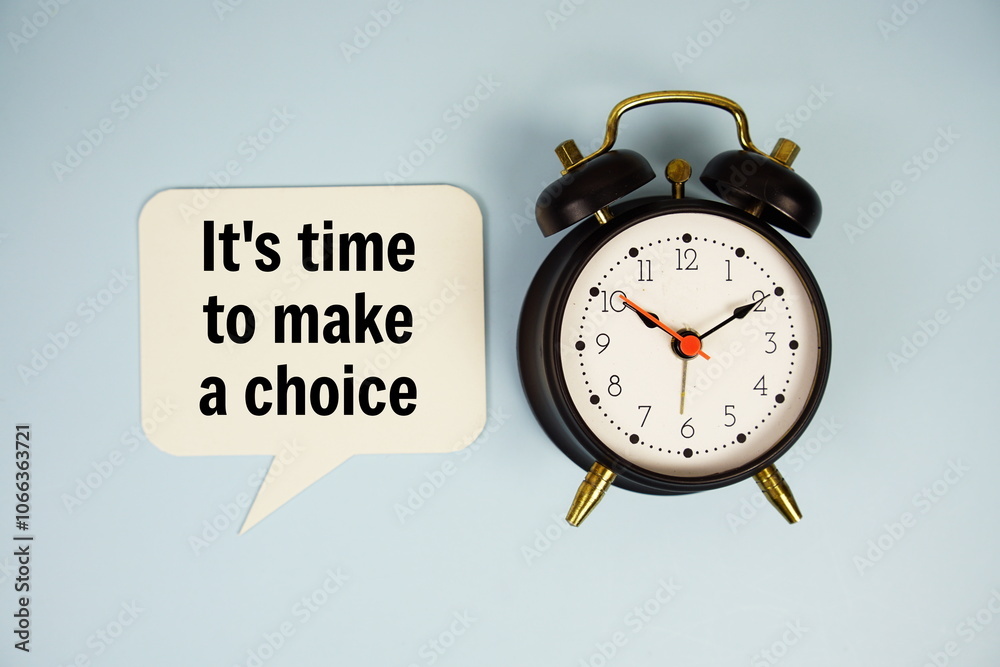 It's time to make a choice text on speech bubble with alarm clock top view on blue background It's time to make a choice text on speech bubble with alarm clock top view on blue background
