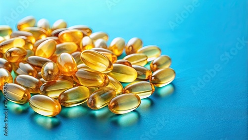 fish oil capsules on blue paper , health, wellness, supplements, vitamins, omega-3, healthy living, nutrition