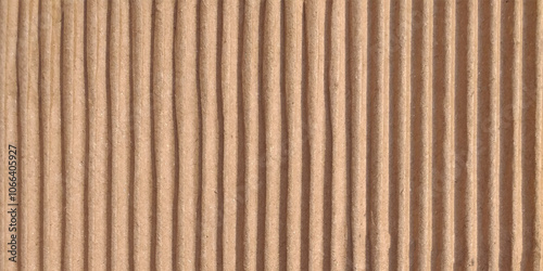 Craft brown paper texture surface macro close up view. Kraft paper texture vertical striped pattern for wrapping. Kraft paper texture background.