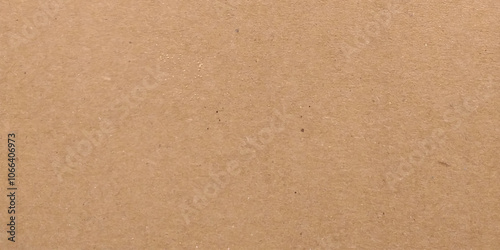 Craft brown paper texture surface macro close up view. Cardboard sheet texture background, pattern of brown kraft paper with vintage style.