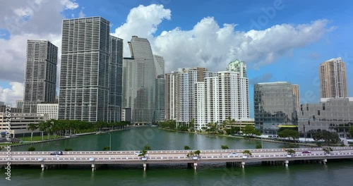 Miami downtown office district in Florida, USA. Brickell Key Bridge. High commercial and residential skyscraper buildings in modern American megapolis photo