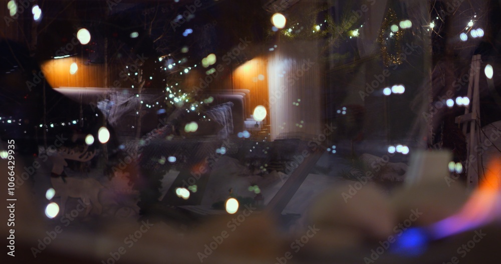 Soft glow of biofire and festive bokeh lights create dreamy, magical ambiance. Reflections blend warm fire with gentle, scattered lights, evoking cozy winter evening with peaceful, holiday charm. Soft glow of biofire and festive bokeh lights create dreamy, magical ambiance. Reflections blend warm fire with gentle, scattered lights, evoking cozy winter evening with peaceful, holiday charm.