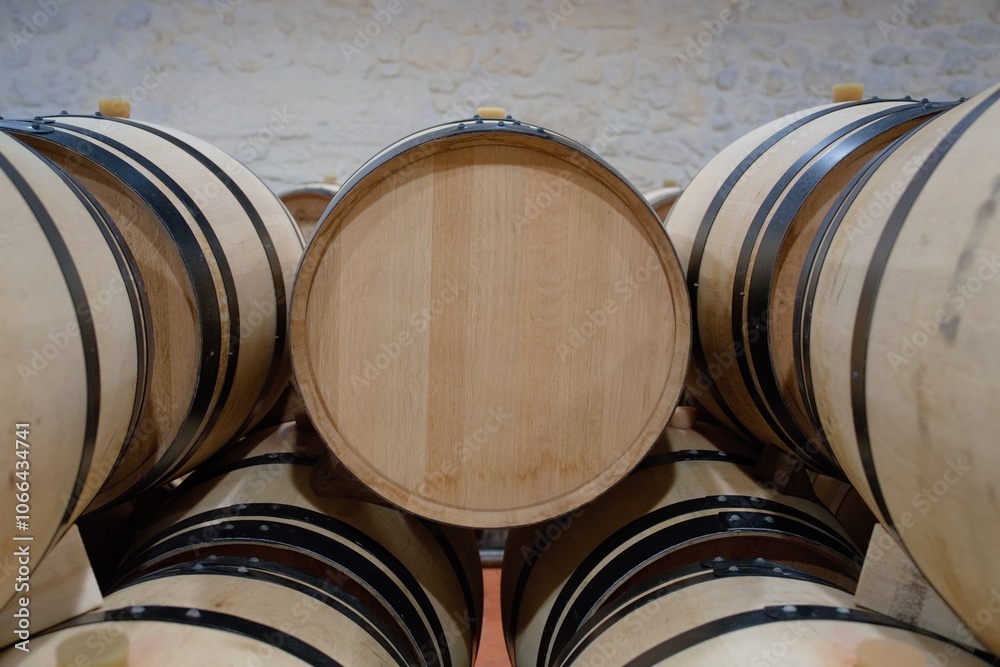 Bordeaux,France - October 4, 2024: Wine barrels made of new French Oak Bordeaux,France - October 4, 2024: Wine barrels made of new French Oak