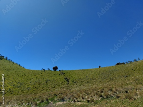 landscape with blue sky In Merbabu Mountain Sabana 2 photo