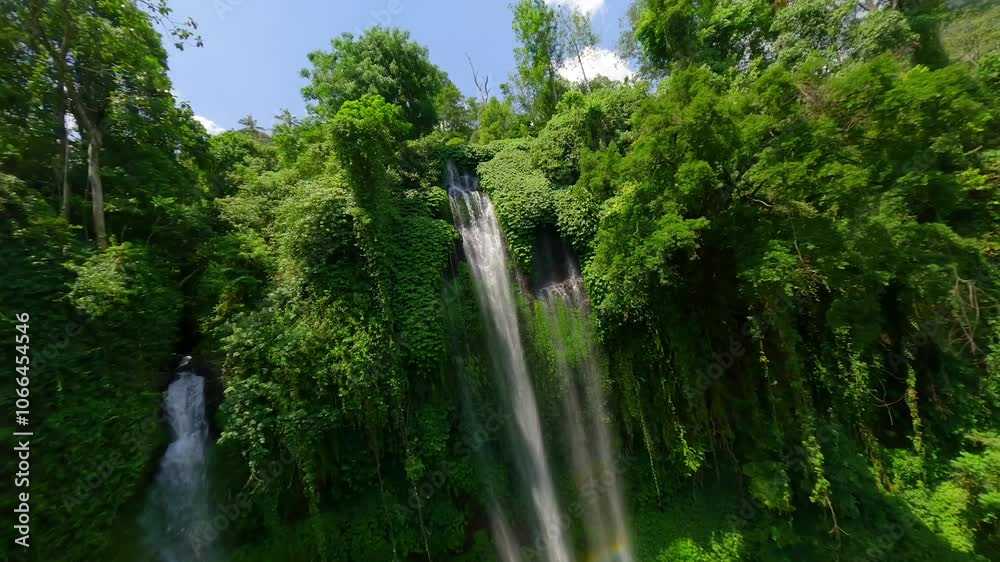 FPV drone dive near the cascading Sekumpul Waterfall, Bali, Indonesia FPV drone dive near the cascading Sekumpul Waterfall, Bali, Indonesia