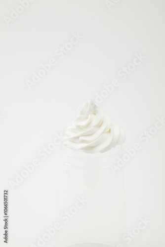 Smooth chocolate cream swirl on a clean white background, perfectly cut out, A silky swirl of chocolate cream, captured in perfect detail on pure white.