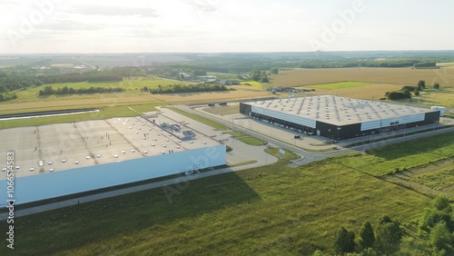 Принти на полотні Two industrial warehouses in countryside