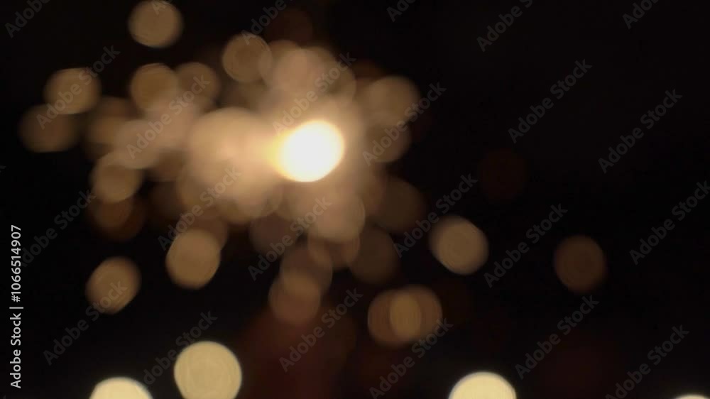 Enchanting scene with a blurred fireworks backdrop, creating bokeh light patterns in a dark setting, perfect for festive projects and celebrations with a magical and vibrant atmosphere Enchanting scene with a blurred fireworks backdrop, creating bokeh light patterns in a dark setting, perfect for festive projects and celebrations with a magical and vibrant atmosphere