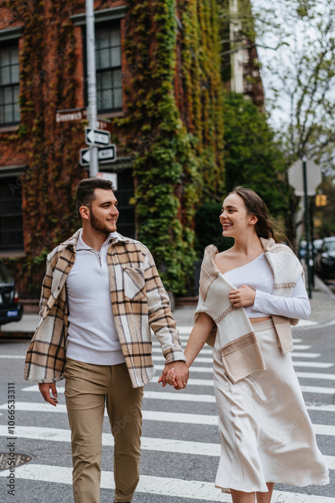 A couple dances gracefully on a city crosswalk, expressing love and joy A couple dances gracefully on a city crosswalk, expressing love and joy