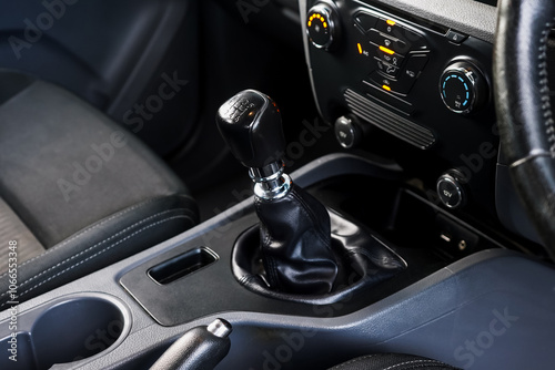 automatic transmission shift selector in the car interior. Closeup a manual shift of modern car gear shifter. 4x4 gear shift