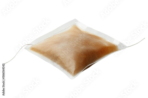 Tea bag with herbal infusion, isolated on transparent or white background photo