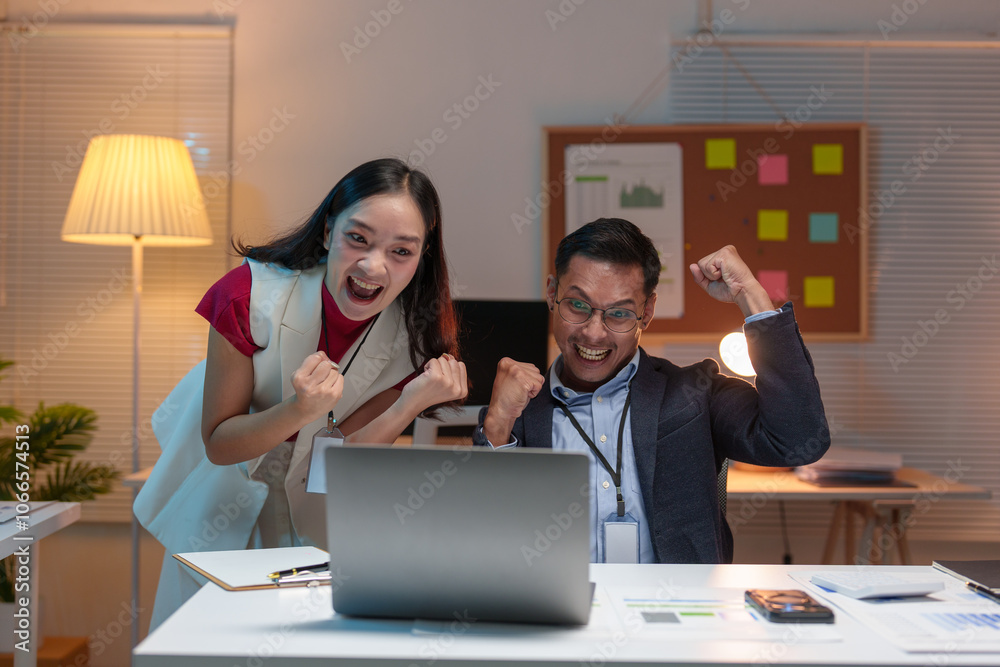 Excited team of Asian businessmen celebrate victory together in office Group of professionals, supervisors and subordinates who are happy and delighted with teamwork concept. Excited team of Asian businessmen celebrate victory together in office Group of professionals, supervisors and subordinates who are happy and delighted with teamwork concept.