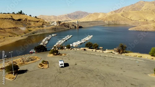 USA, CA, Visalia, Lake Kaweah, 45586 - Drone view of Lake Kaweah. Lemon Hill Recreation Area and the Kaweah Heritage Visitor Center is the parking lot, and the marina, dam and spillway photo