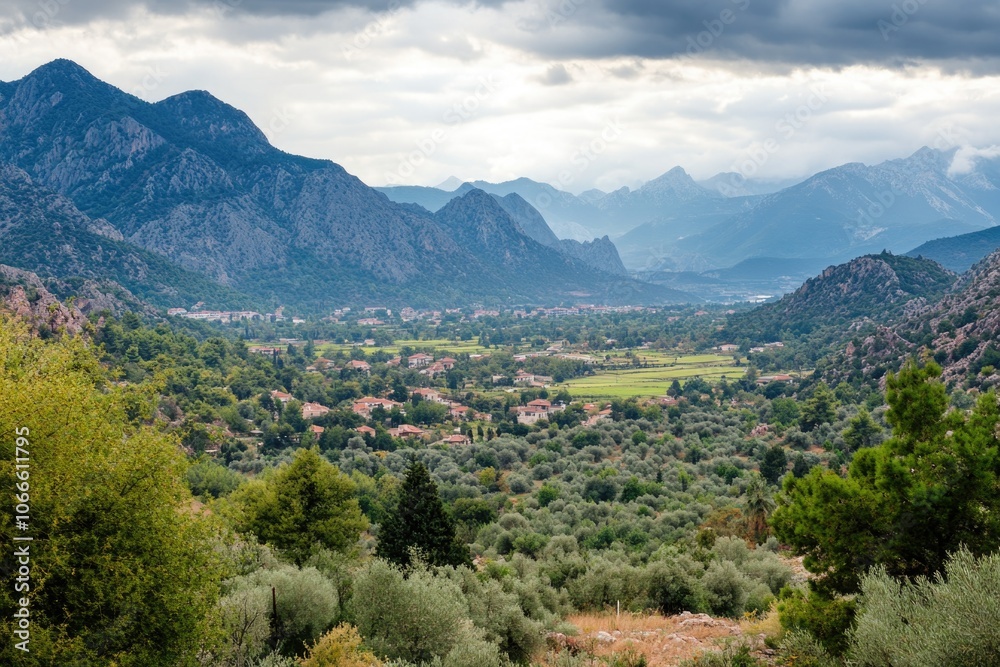 Naklejka premium Valley landscape with mountains in the background