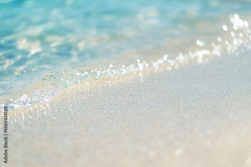 A close-up view of a wave crashing on the beach, with water and sand in motion A close-up view of a wave crashing on the beach, with water and sand in motion