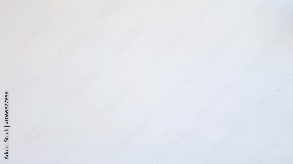 Close up bare feet of Unrecognizable woman walking gracefully on white background, wearing flowing white dress Close up bare feet of Unrecognizable woman walking gracefully on white background, wearing flowing white dress