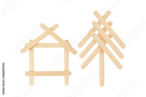 house and tree made from wood Ice cream sticks isolated on white background photo