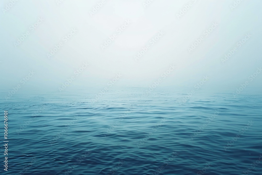 Obraz premium Foggy Water. Calm Blue Ocean Landscape with Hazy Sky Background