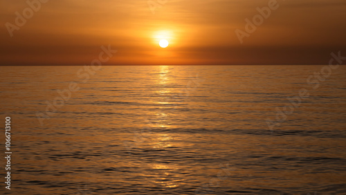 Calm sea in the evening silence in orange tones, relax.