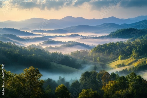 Serene mountain scenery bathed in the golden light of early morning, with mist clinging to the valleys and rolling hills