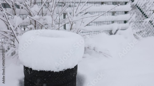Close-up of a snow-covered object, highlighting the soft texture and purity of fresh snow.