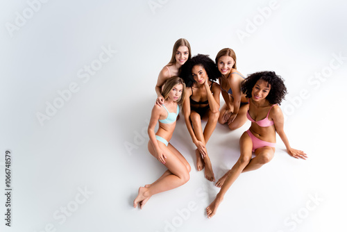 Wallpaper Mural Full length photo of five confident stunning model girls empty space underwear studio background Torontodigital.ca
