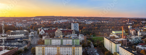 A look from of part of the city of Chemnitz, showing the popular public park and lake and business and residential buildings around the streets the land to the city center.