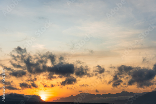 Beautiful Blazing Sunrise and golden sky landscape over the Sea.