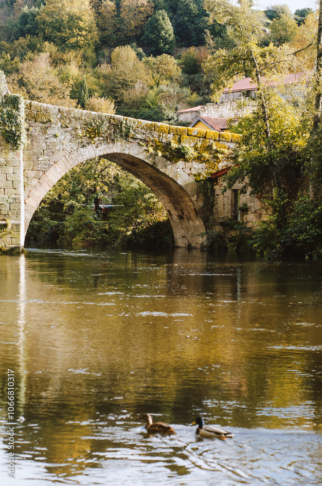 medieval stone bridge over the Arnoia river in Allariz in autumn. Galicia medieval stone bridge over the Arnoia river in Allariz in autumn. Galicia