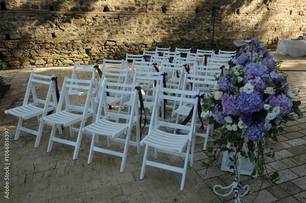 Bohemian Wedding Arch Decorated with Pampas Grass and Pink Flowers Outdoors