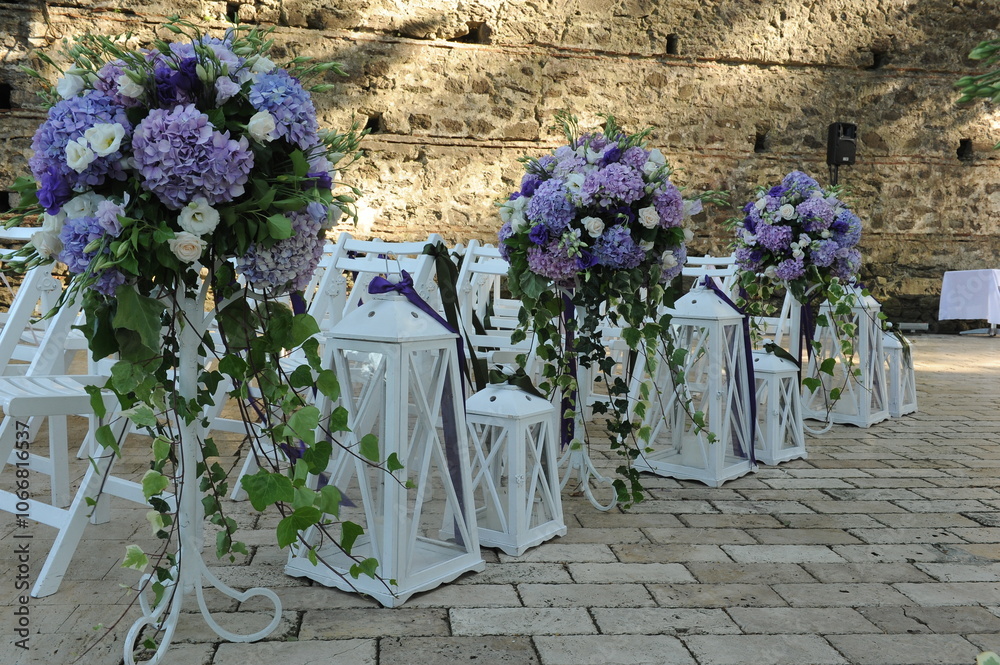 Bohemian Wedding Arch Decorated with Pampas Grass and Pink Flowers Outdoors