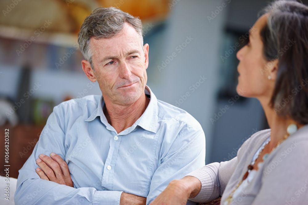 Fototapeta premium Mature, couple and conflict with fight at house for marriage argument, divorce discussion and relationship disaster. People, angry and communication with loyalty fail, toxic partner and jealous drama