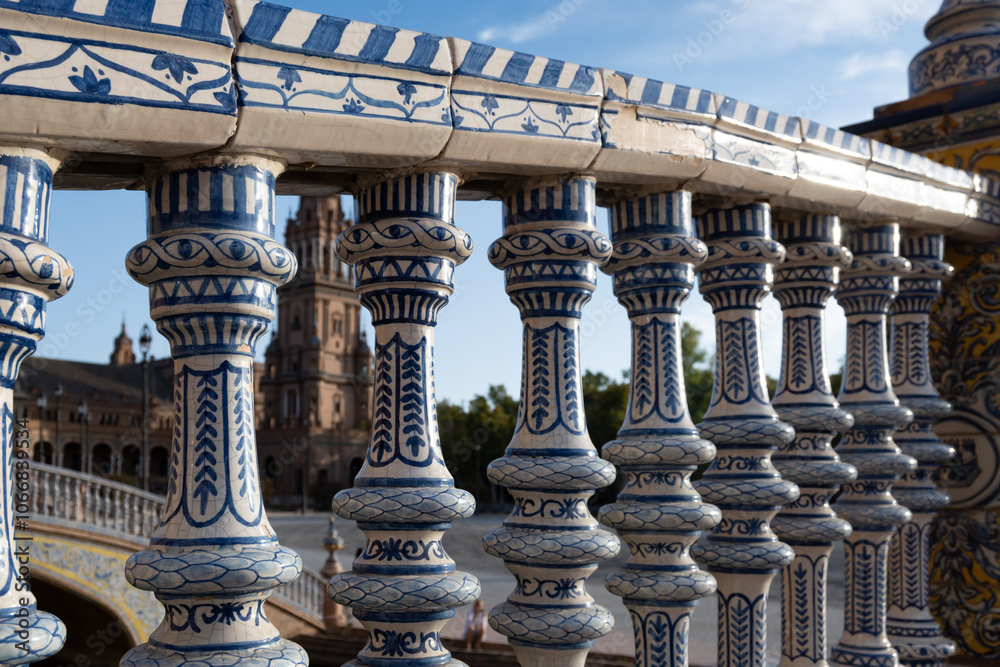 Fototapeta premium Old historical Andalusian town Seville, Spain. View on architectural details and ceramic tiles of buidings. Summer in Andalusia.