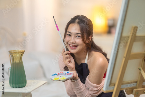 Woman Painting at Home Studio